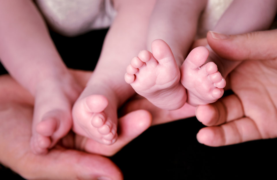 Photo of newborn baby feet.