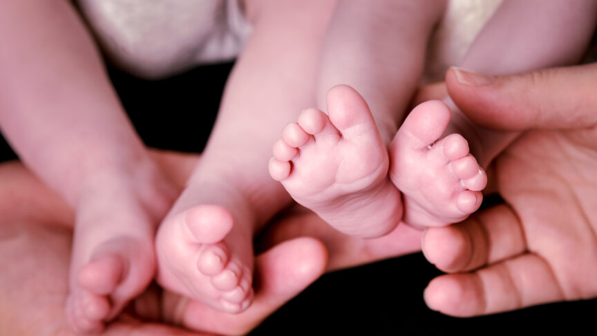 Photo of newborn baby feet.