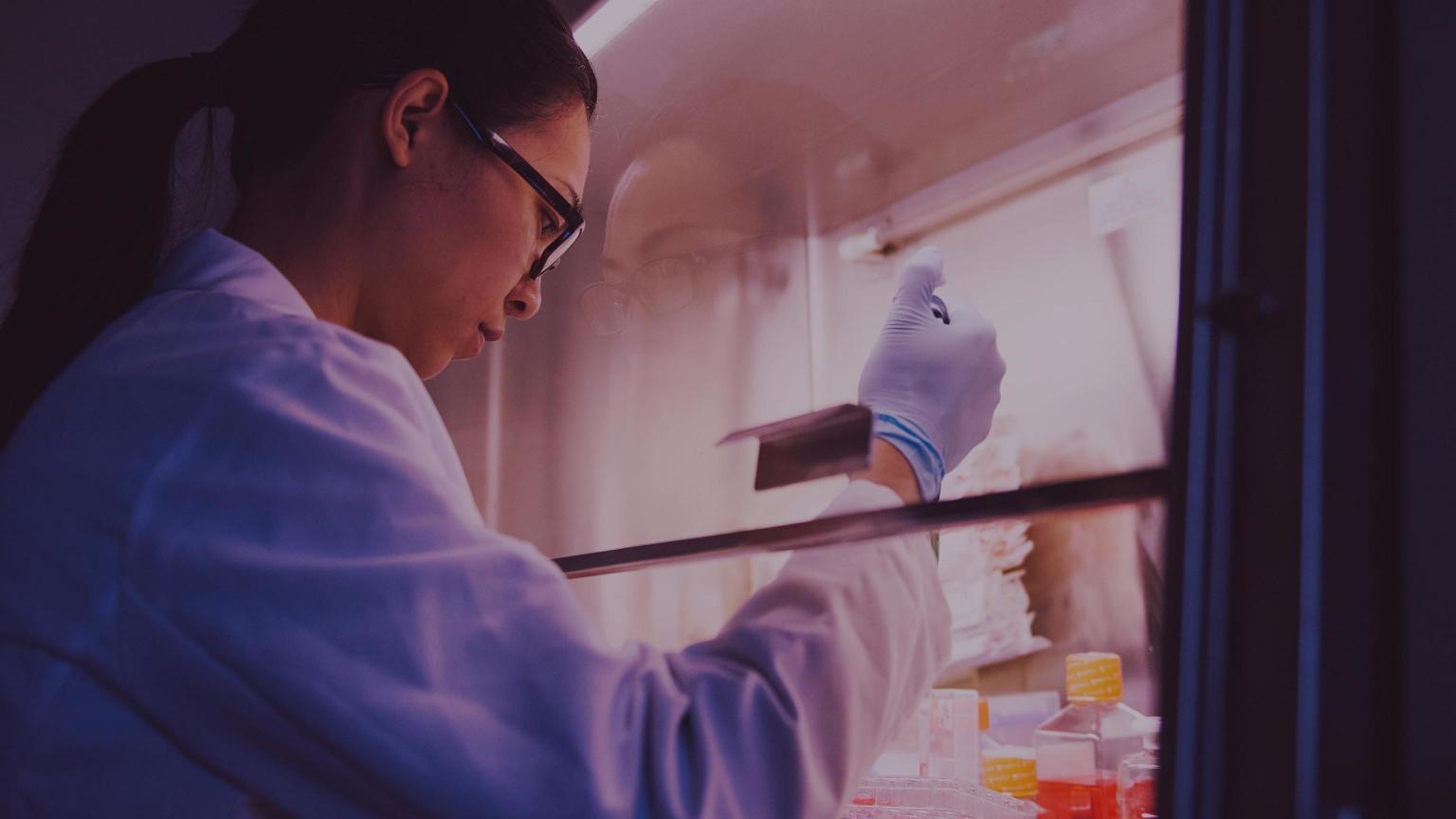 Photo of researcher in a lab.